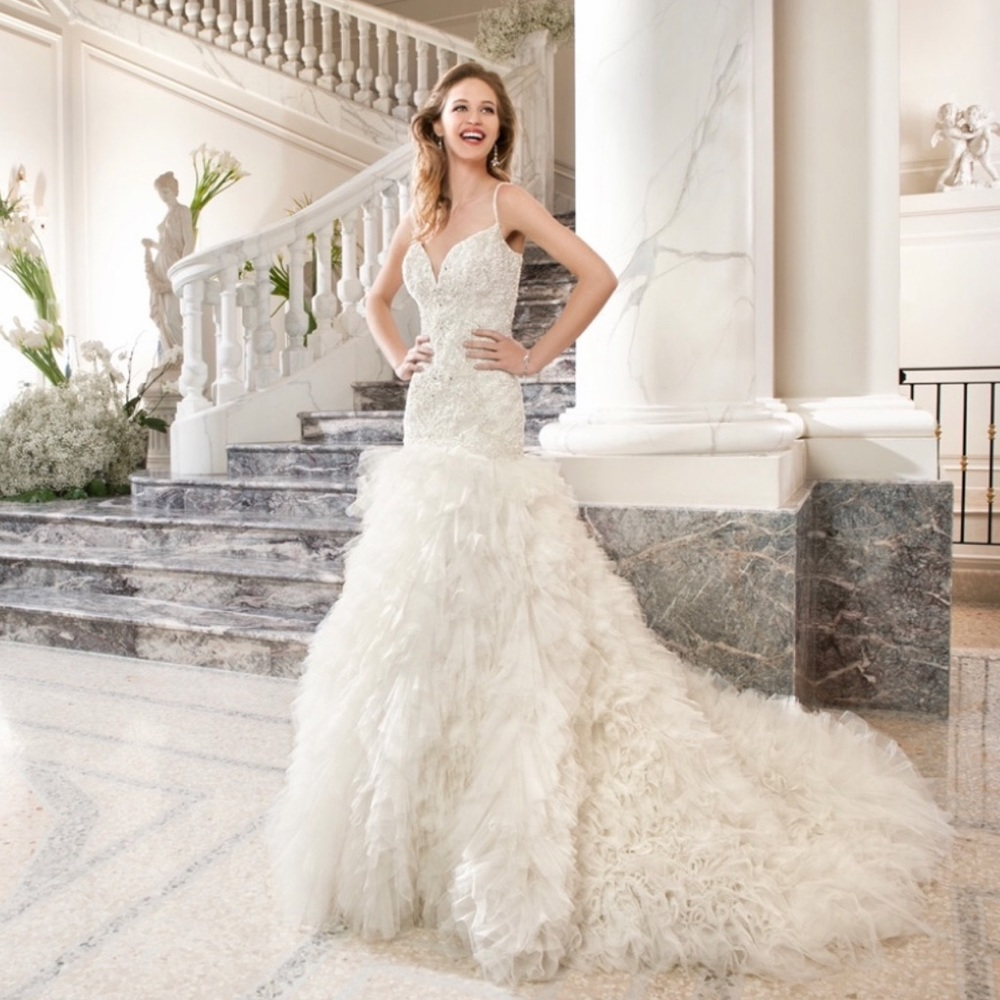 Brand New, Never worn Demetrios backless mermaid ruffled wedding dress.